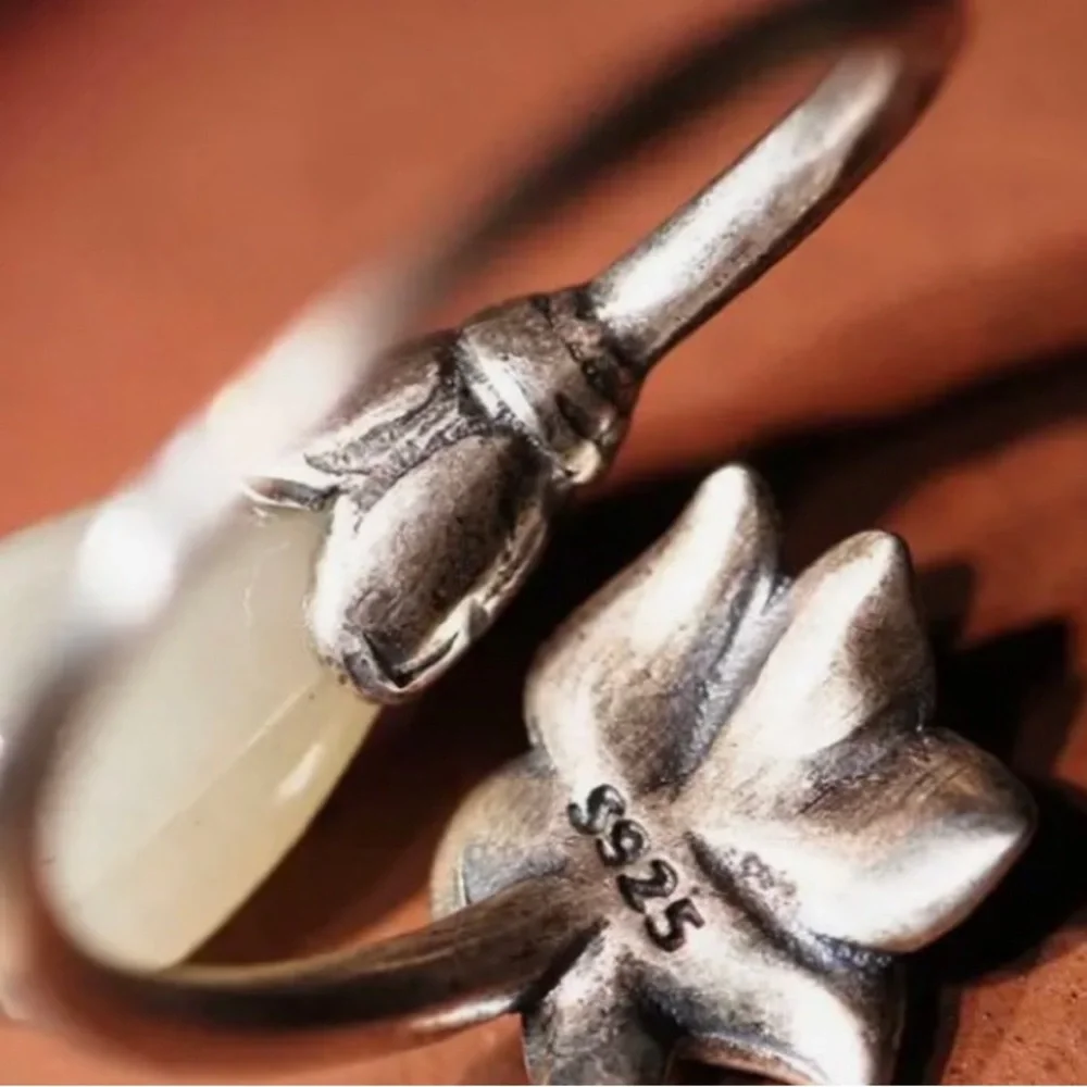 925 SILVER LOTUS FLOWER W WHITE JADE
LOTUS BLOOM RING - Picture 4 of 7